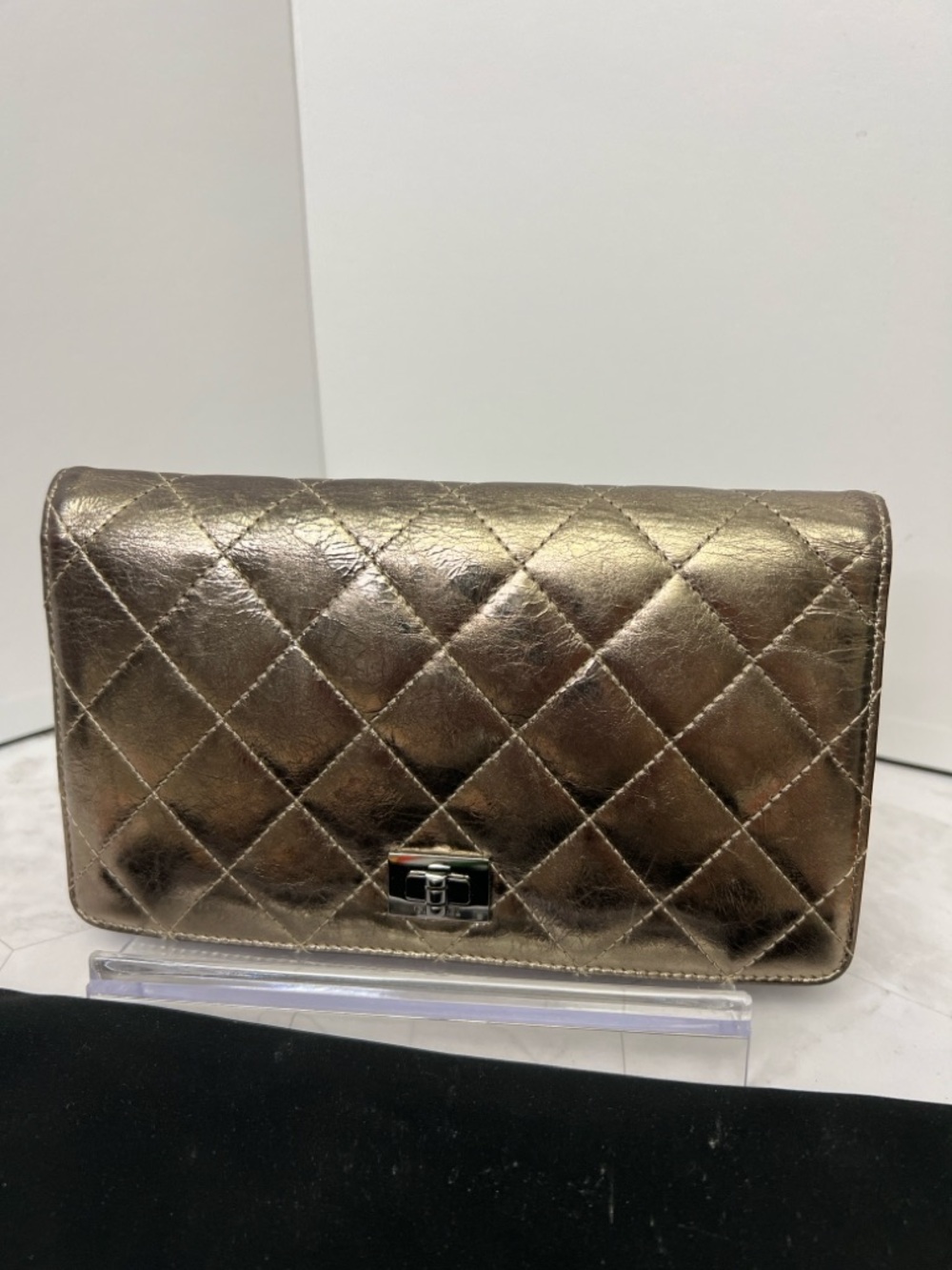 CHANEL Metallic Quilted Wallet in Shimmering Gold